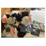 2 containers of clothes Size L/XL