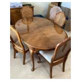 Thomasville dining table, 6 chairs, 2 leaves, pads
