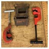 2 pipe cutters and a Game Junior sad iron heater