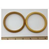 2 mustard yellow Bakelite bangle bracelets