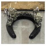 Miner working with gold pyrite on horseshoe