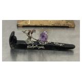 Miner on a railroad spike with pyrite and amethyst