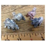 4 carved jasper dinosaurs
