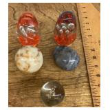 Art glass paperweights and polished stones