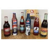 6 old soda bottles