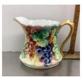Hand painted porcelain pitcher