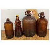 4 brown glass bottles