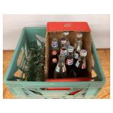Milk crate full of soda bottles