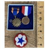 Military medals and US Army Service Forces patch