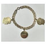 14k gold charm bracelet with 3 charms