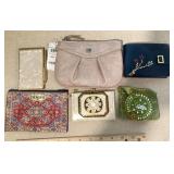 Wallets, mirror, mother-of-pearl notepad