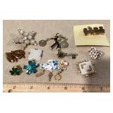 Costume jewelry brooches and pins