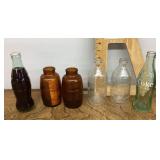 6 old soda bottles
