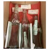 3 old Coca-Cola bottles