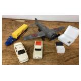Toy cars, trucks, and airplane