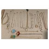 Group of gold tone costume jewelry necklaces