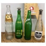 4 old soda bottles