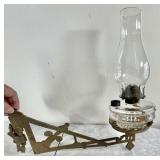 Art Deco cast iron lamp bracket with oil lamp
