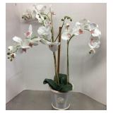 Faux orchid in planter pot
