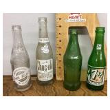 4 old soda bottles