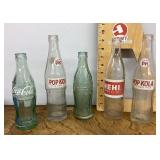 5 old soda bottles