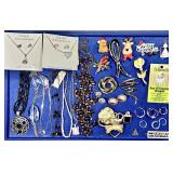Costume jewelry brooches, necklaces, rings