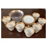 Teacups and saucers, gold rimmed bowl