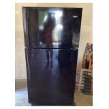 Black Whirlpool refrigerator