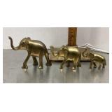 3 brass elephants