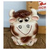 Ceramic cow coin bank