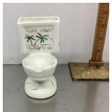 Souvenir toilet ashtray and cigarette holder