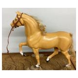 3 fashion dolls and horse