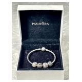 Sterling silver Pandora bracelet with 4 beads
