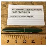 Green Sheaffer fountain pen with 14k nib