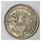 One troy ounce .999 fine silver round