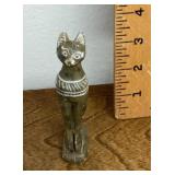 Carved marble cat figure with chipped ear