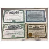 4 old stock certificates