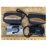2 Olympus digital cameras