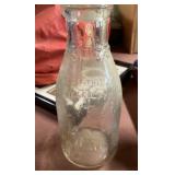 Pevely Dairy embossed milk bottle