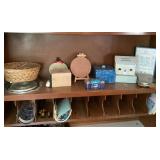 Contents on shelf next to refrigerator