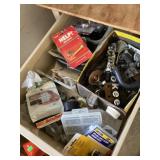 Drawer full of assorted car parts