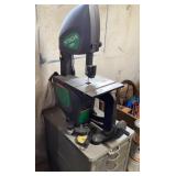 Hitachi bandsaw mounted on cabinet