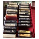 Groups of 8-track tapes in storage boxes