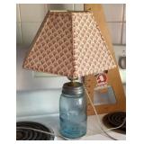 Converted blue canning jar lamp