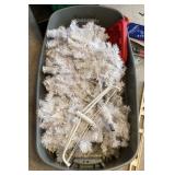White Christmas tree and tub of ornaments