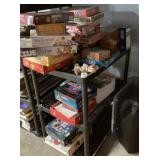 Shelf full of  board games and puzzles