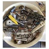 Budweiser tray full of car badges and handles