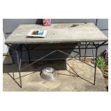 Outdoor work table with heavy concrete top