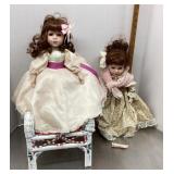 Porcelain dolls and wicker chair