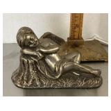 Sleeping cherub paperweight